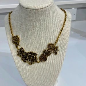 Ann Taylor bronze color necklace.  Please see design front and back